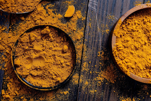 bowls filled with turmeric powder